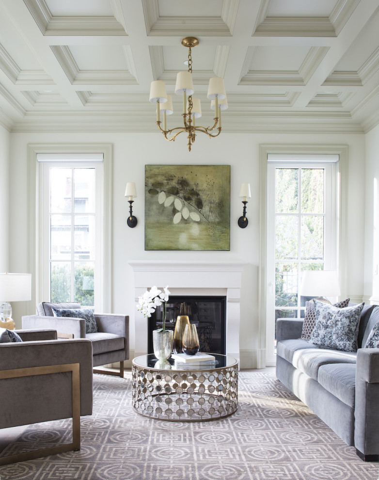 Inspiration for a transitional formal living room in Vancouver with white walls, a standard fireplace and no tv.