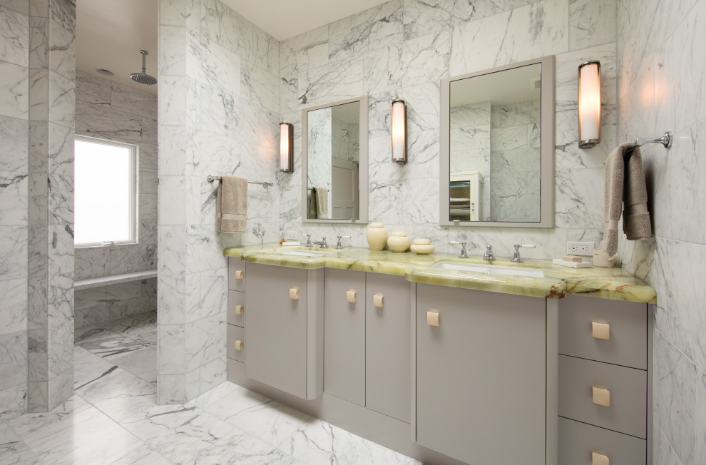 Photo of an eclectic bathroom in San Francisco with flat-panel cabinets, grey cabinets, an open shower, black and white tile, marble, marble floors, an integrated sink, marble benchtops, an open shower, yellow benchtops, a shower seat, a double vanity and a built-in vanity.