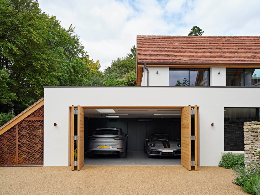 This is an example of a large traditional detached two-car garage in Buckinghamshire.
