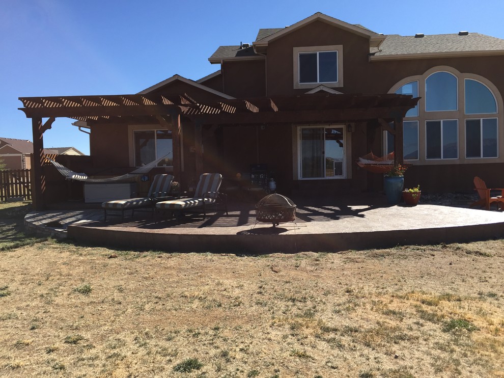 Mountain style home design photo in Denver