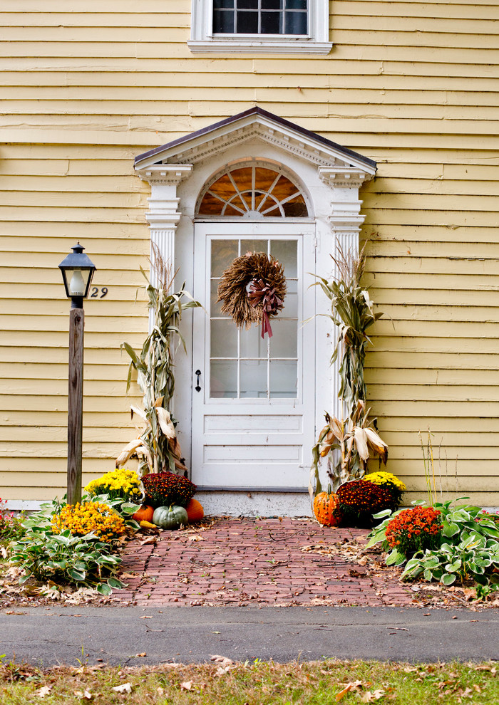 Inspiration for a farmhouse entryway remodel in New York