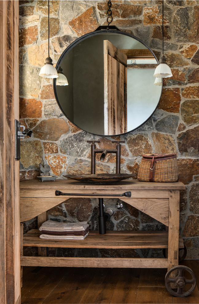 Design ideas for a country bathroom in Other with medium wood cabinets, dark hardwood floors, a vessel sink, wood benchtops, brown floor and brown benchtops.