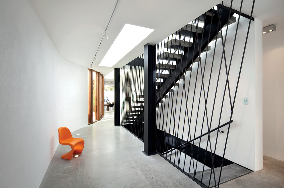 Design ideas for a contemporary concrete straight staircase in Melbourne with open risers.