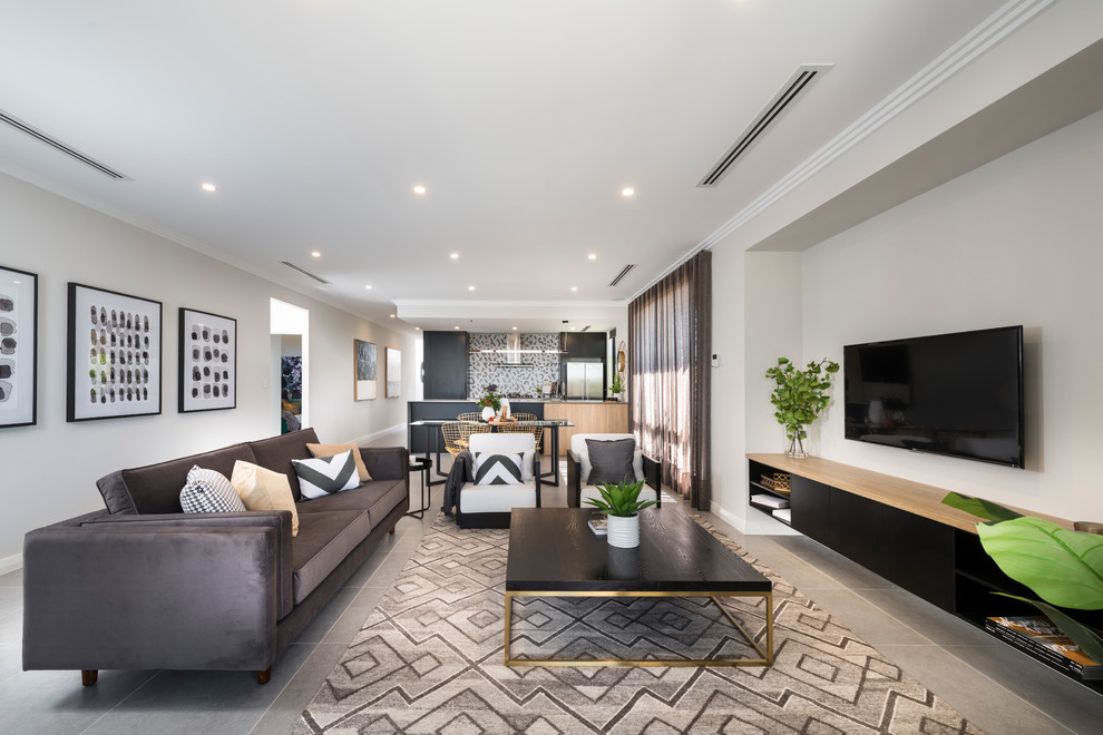 Mid-sized contemporary open concept living room in Perth with white walls, porcelain floors, a wall-mounted tv and grey floor.