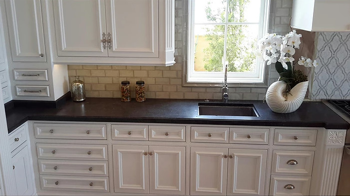Kitchen - huge kitchen idea in Orange County with an island