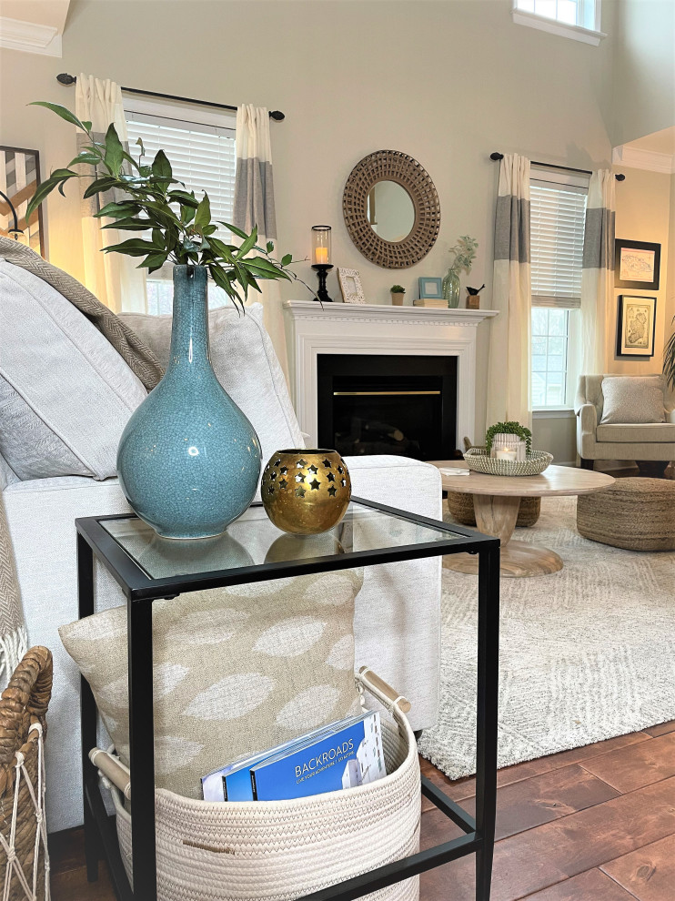 Large transitional family room photo in DC Metro with white walls