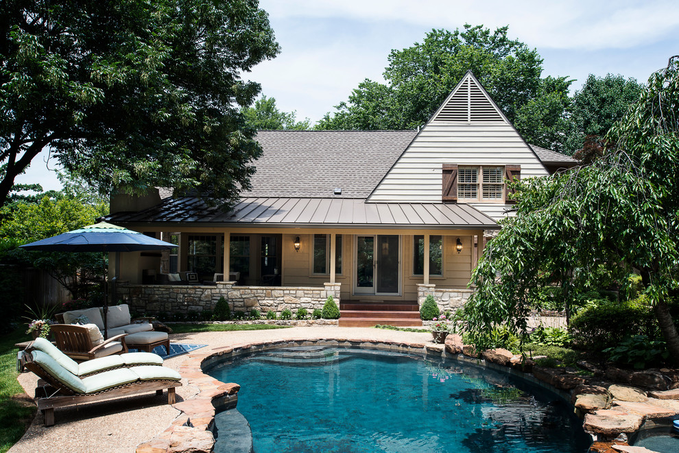 Pool - mid-sized transitional backyard custom-shaped lap pool idea in Denver