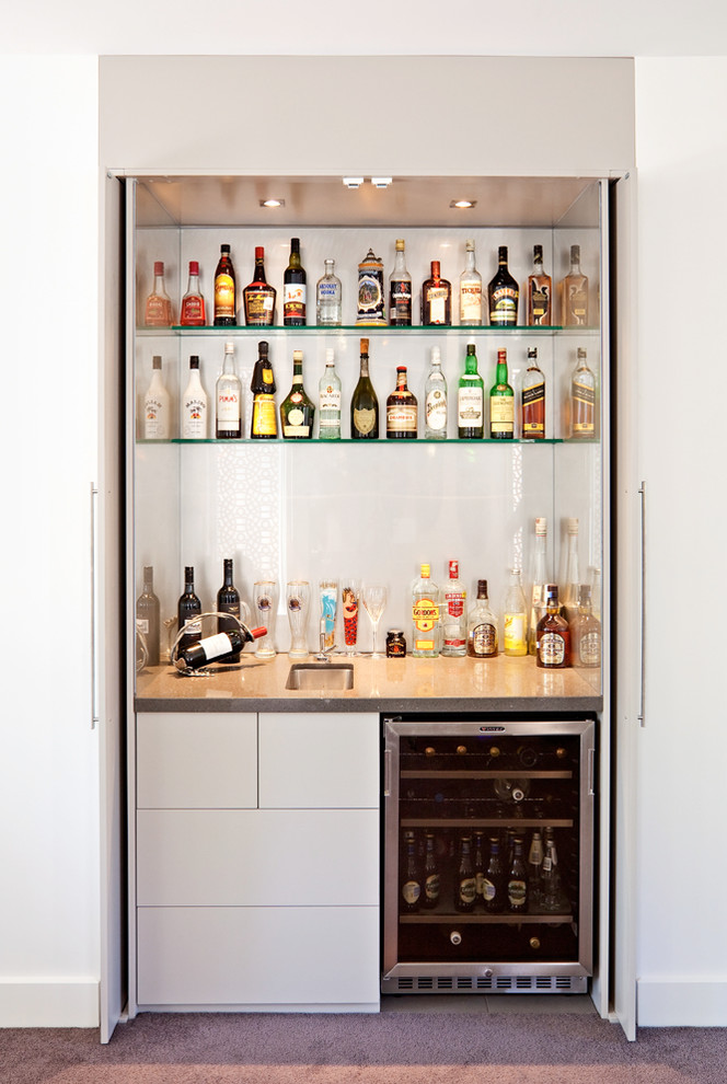 Photo of a contemporary home bar in Melbourne.