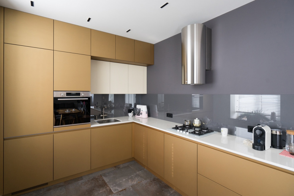 Design ideas for a contemporary l-shaped eat-in kitchen in Saint Petersburg.