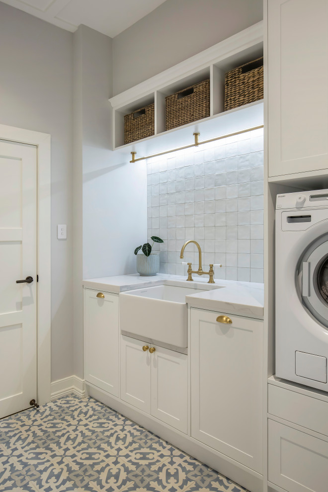 Photo of a transitional laundry room in Sydney.