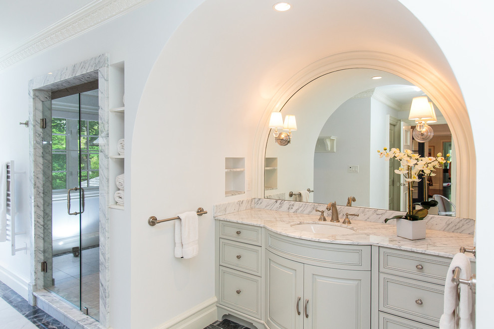 Inspiration for a large traditional 3/4 bathroom in Boston with white cabinets, a corner shower and white walls.