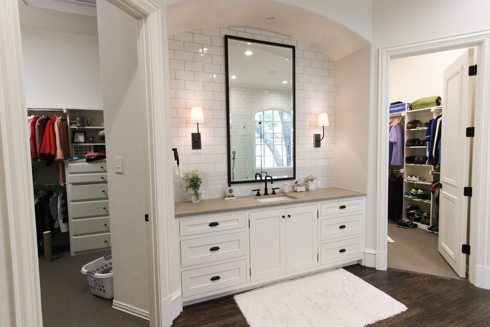 Photo of a large transitional master bathroom in Dallas with an undermount sink, white cabinets, soapstone benchtops, a drop-in tub, white tile, subway tile, white walls, dark hardwood floors, shaker cabinets and an alcove shower.