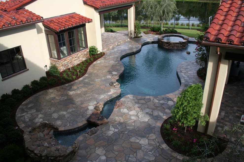 Example of a mountain style pool design in Orlando