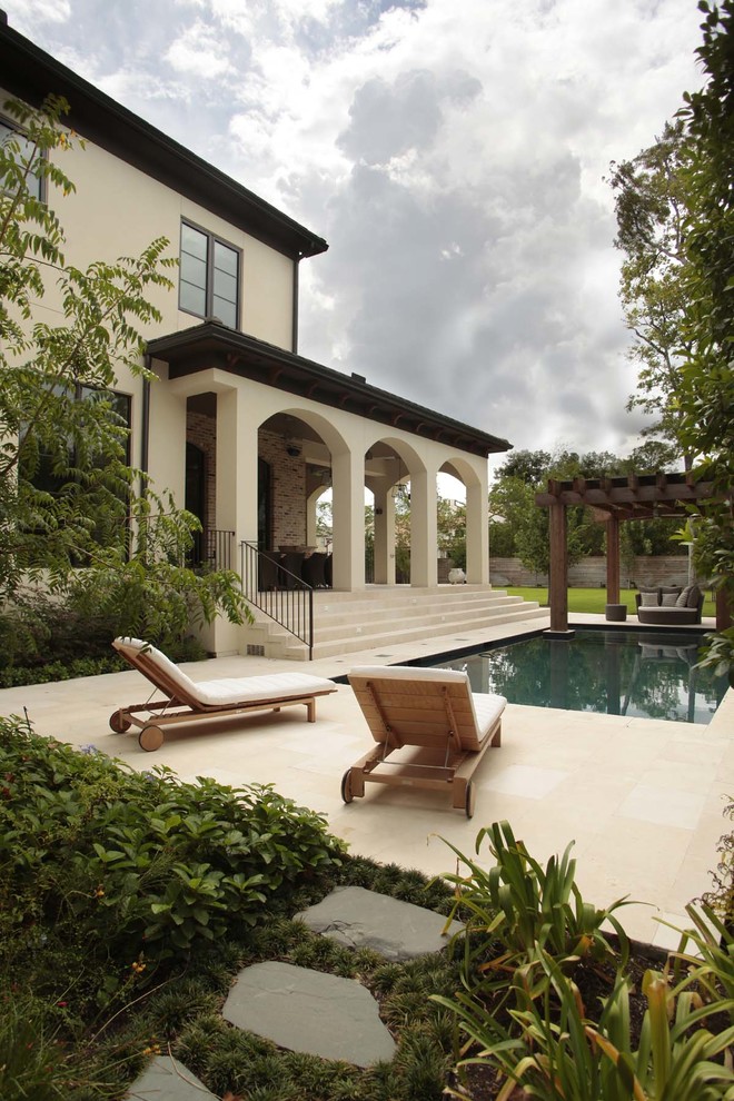Inspiration for a large transitional home design in Houston.