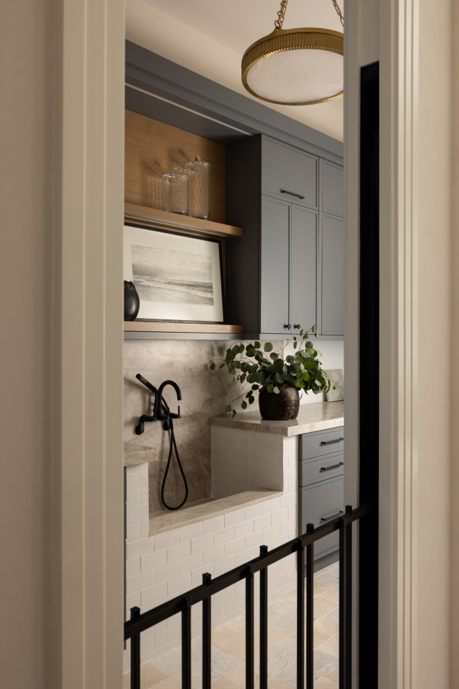 Example of a transitional laundry room design in Orlando