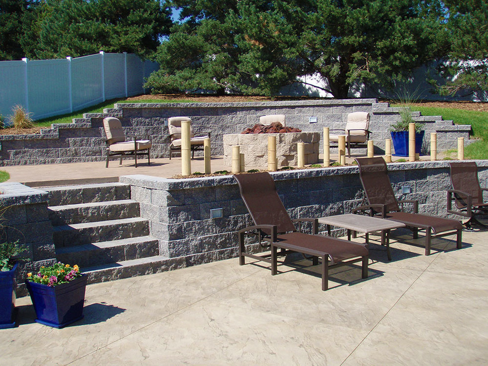 Mid-sized backyard concrete paver full sun patio photo in Omaha