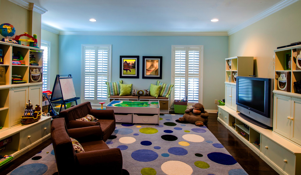 Design ideas for a large traditional kids' playroom for kids 4-10 years old and boys in Tampa with blue walls, dark hardwood floors and brown floor.