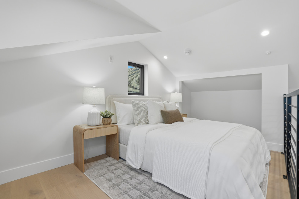 Loft Bedroom in Modern ADU with Sloped Ceiling
