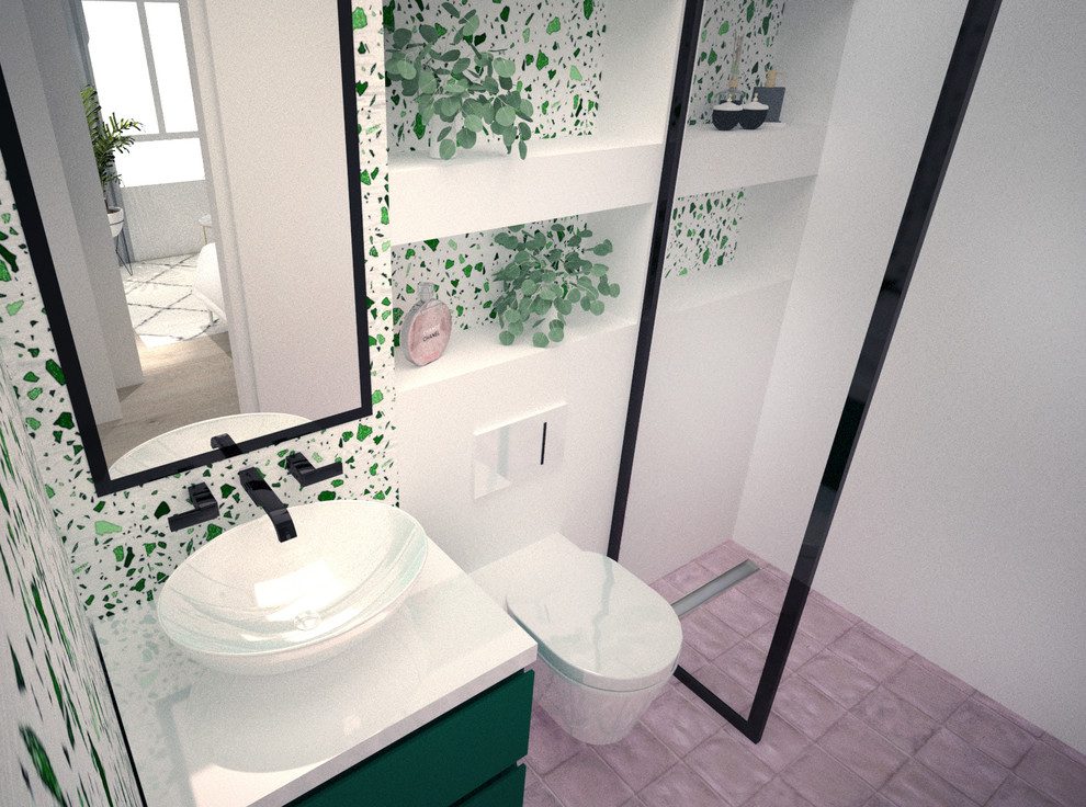 This is an example of a small tropical powder room in Madrid with a two-piece toilet, pink tile, stone tile, green walls, porcelain floors, a vessel sink, engineered quartz benchtops, pink floor and white benchtops.