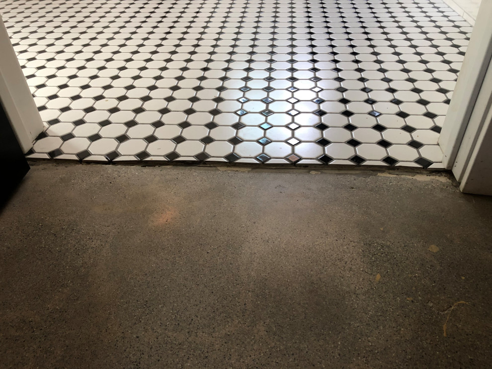 Transition from bathroom tiles to concrete