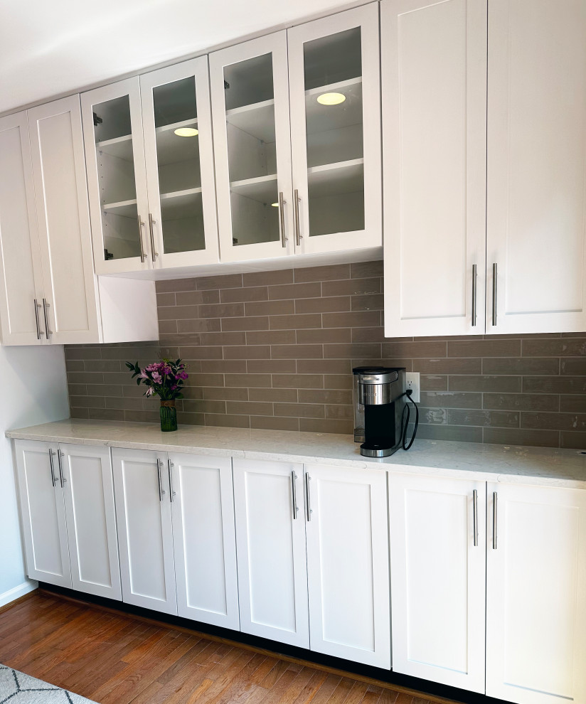 Small transitional single-wall eat-in kitchen photo in DC Metro with shaker cabinets, quartz countertops, cement tile backsplash, white countertops, white cabinets and beige backsplash