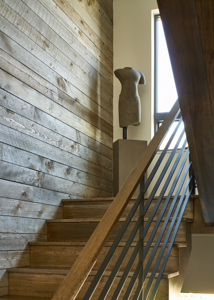 Inspiration for a large country wood u-shaped staircase in Salt Lake City with wood risers and wood railing.
