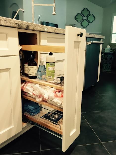 Example of an arts and crafts porcelain tile kitchen design in Austin with shaker cabinets, white cabinets, granite countertops, white backsplash, subway tile backsplash and stainless steel appliances