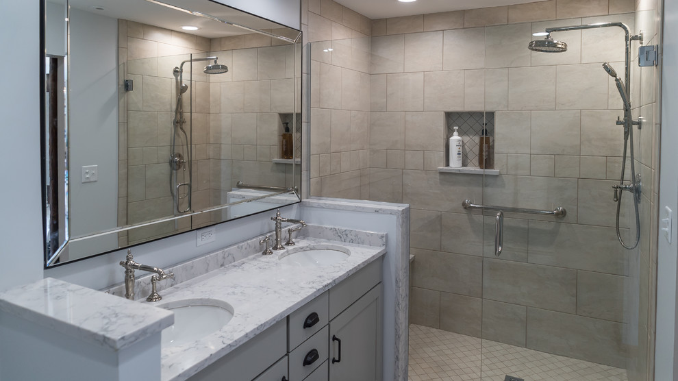 This is an example of a mid-sized country master bathroom in Chicago with shaker cabinets, grey cabinets, an open shower, beige tile, porcelain tile, porcelain floors, an undermount sink, engineered quartz benchtops, grey floor and a hinged shower door.