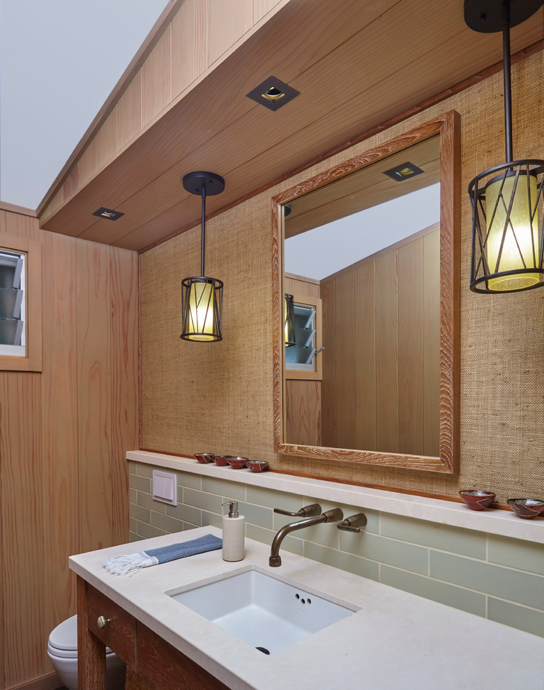 Design ideas for a tropical powder room in Hawaii with an undermount sink.
