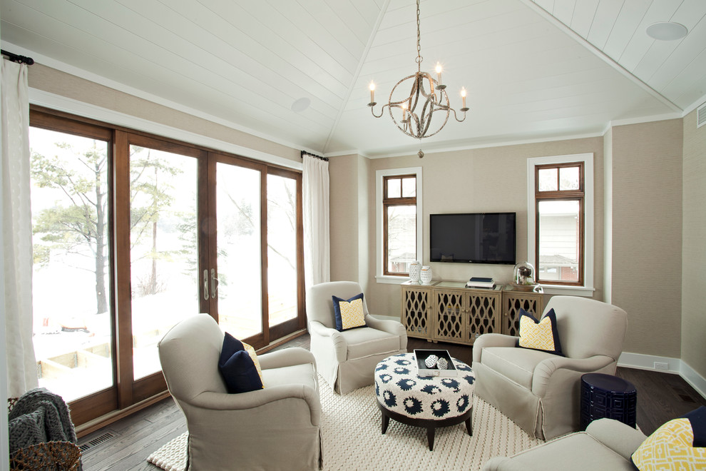 Transitional family room in Minneapolis with beige walls.