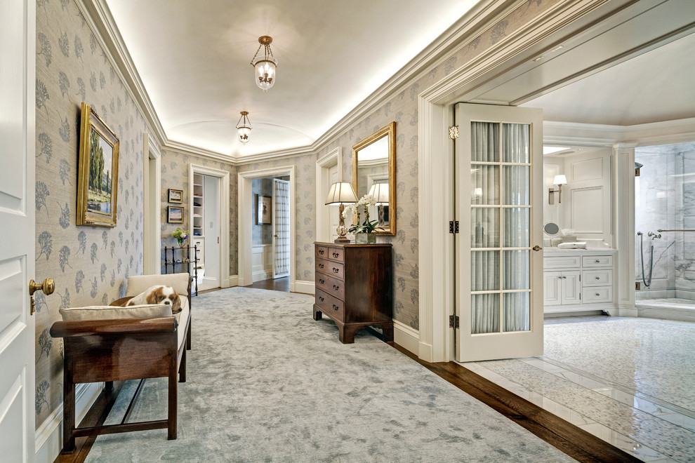 Inspiration for a transitional hallway in New York with grey walls and carpet.
