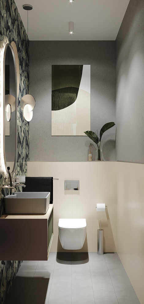 Idées déco pour un WC suspendu contemporain avec un mur gris, un sol gris et meuble-lavabo suspendu.