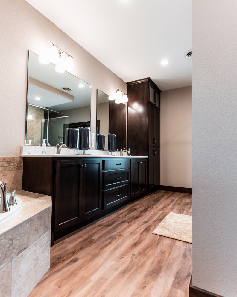 Bathroom - huge transitional master beige tile and ceramic tile vinyl floor, brown floor and double-sink bathroom idea in Other with flat-panel cabinets, dark wood cabinets, a hot tub, an undermount sink, quartz countertops, a hinged shower door, white countertops and a built-in vanity