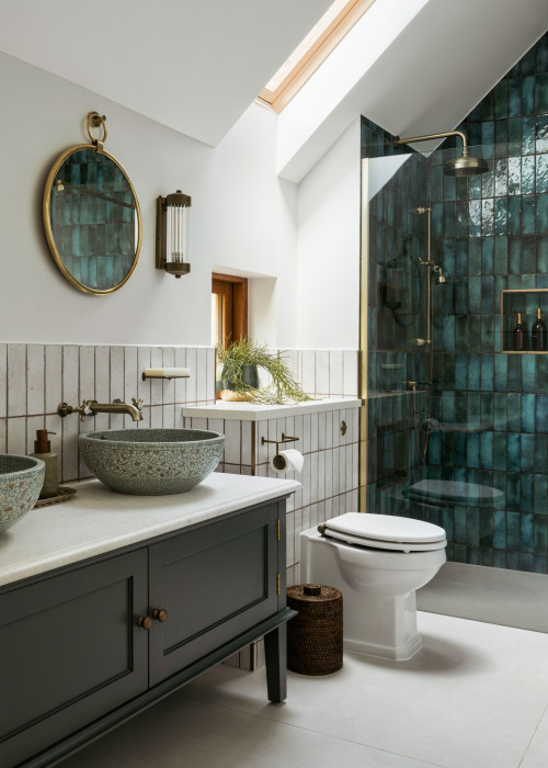 Traditional Bathroom with Gray Vanity and Subway Tile Backsplash