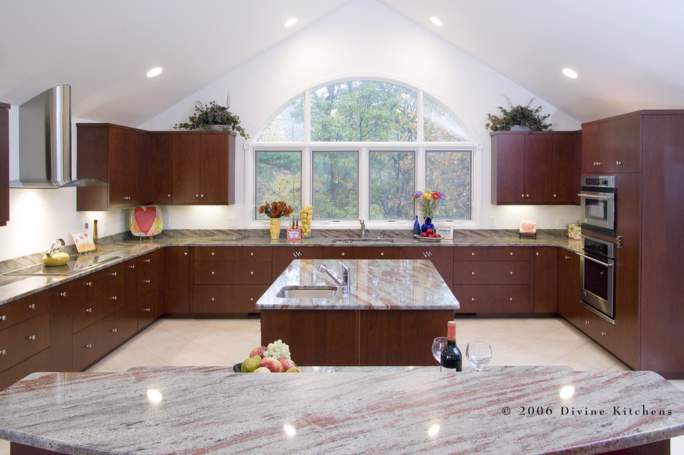 This is an example of a large contemporary u-shaped eat-in kitchen in Boston with a double-bowl sink, flat-panel cabinets, dark wood cabinets, granite benchtops, white splashback, stainless steel appliances, ceramic floors and multiple islands.