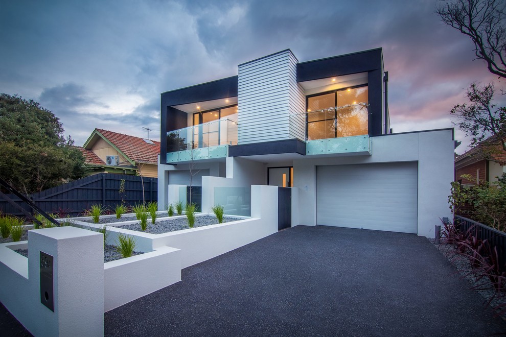 Contemporary two-storey exterior in Melbourne with a flat roof.