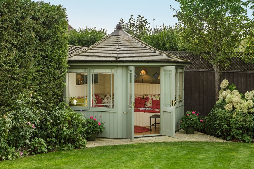 Design ideas for a mid-sized traditional detached shed and granny flat in Surrey.