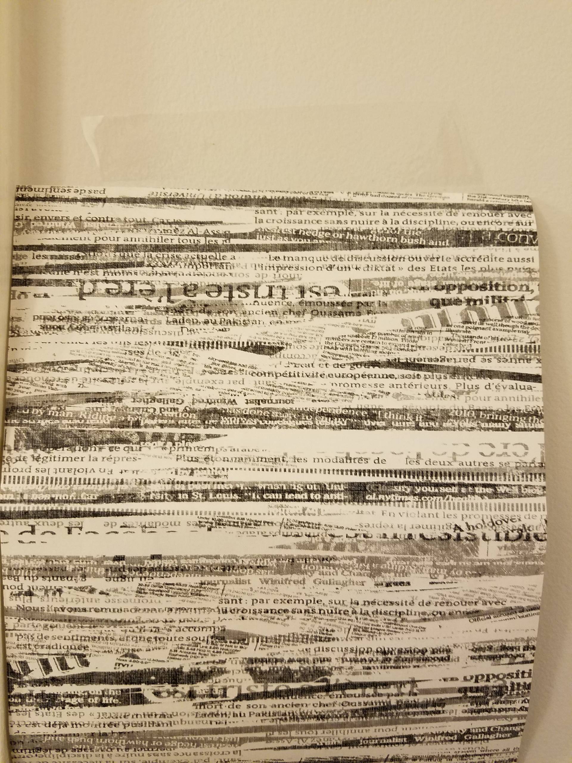Wallpaper Install: Newsprint in Art Deco Powder Room