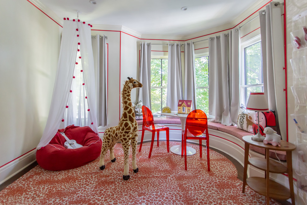 Design ideas for a transitional kids' playroom for kids 4-10 years old and girls in Chicago with beige walls, carpet and red floor.