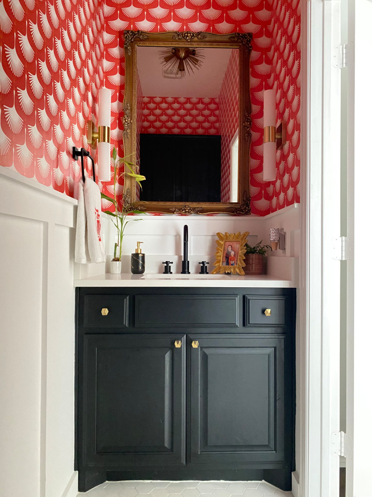 Design ideas for a small eclectic cloakroom in Dallas with black cabinets, a one-piece toilet, orange walls, marble flooring, a submerged sink, engineered stone worktops, white floors, white worktops, a built in vanity unit and wallpapered walls.