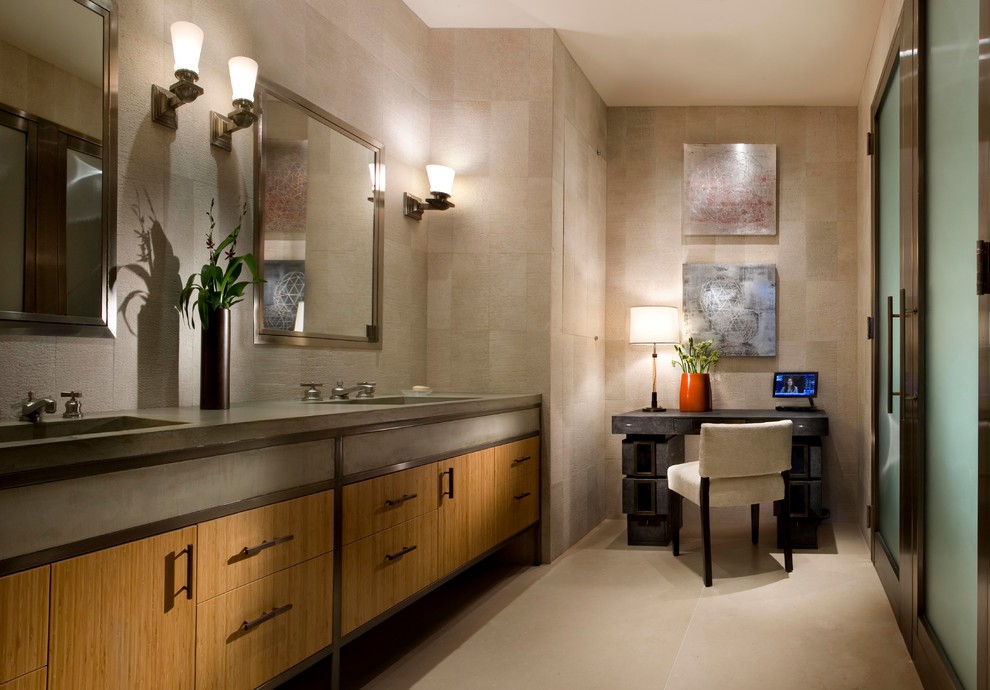 Design ideas for a mid-sized asian master bathroom in New York with flat-panel cabinets, medium wood cabinets, beige walls, ceramic floors, solid surface benchtops, an undermount sink and grey floor.