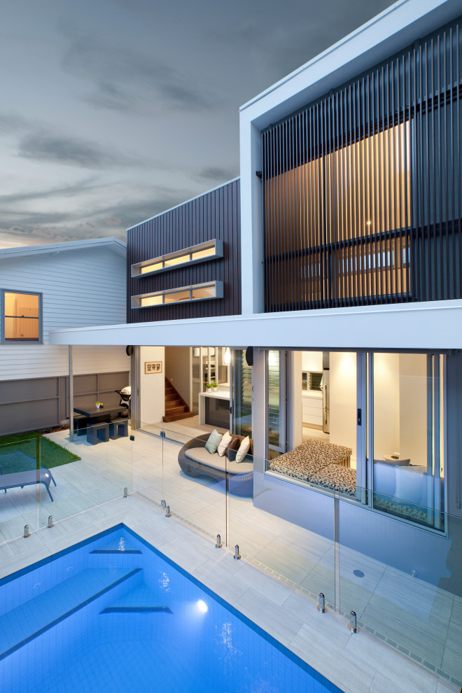 This is an example of a modern home design in Gold Coast - Tweed.
