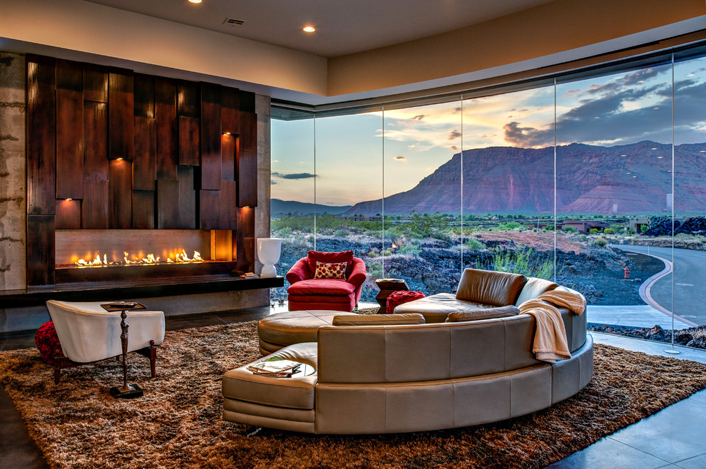 This is an example of a contemporary living room in Salt Lake City with a ribbon fireplace and a wood fireplace surround.