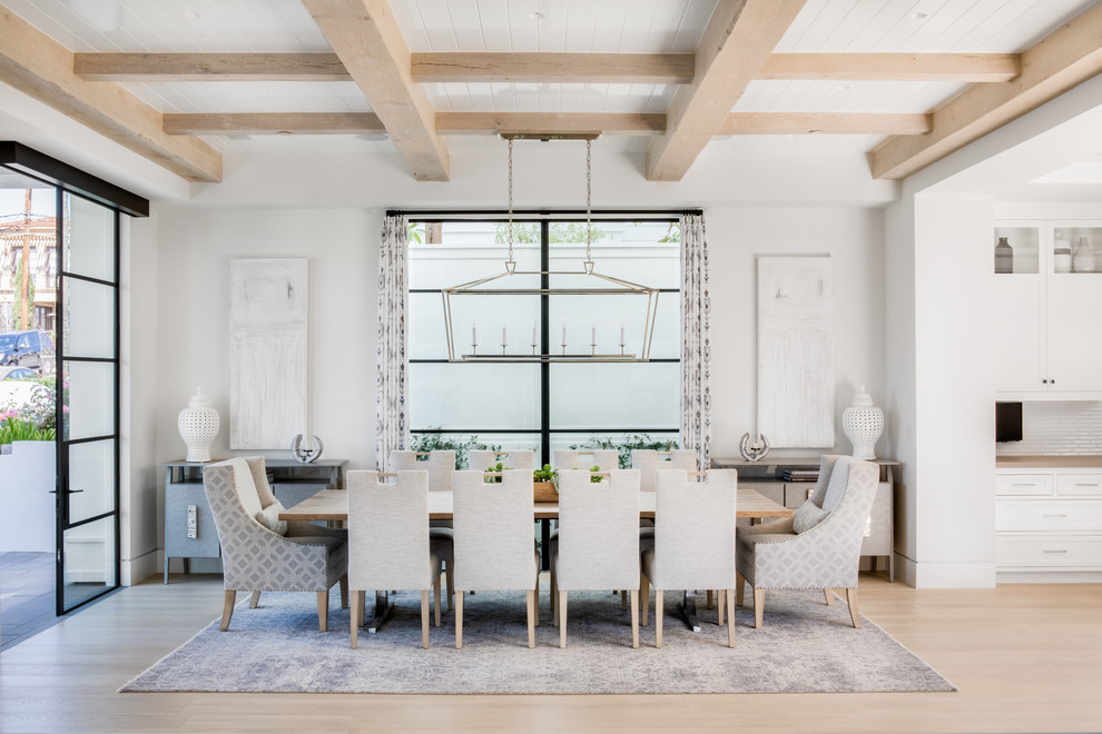 Design ideas for a coastal dining room in Orange County.