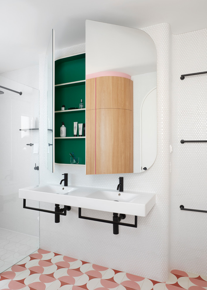 Inspiration for a small scandinavian bathroom in Melbourne with white tile, mosaic tile, white walls, cement tiles, a wall-mount sink, a curbless shower and multi-coloured floor.