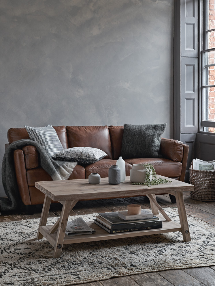 Scandinavian living room in London with grey walls, dark hardwood floors and no fireplace.
