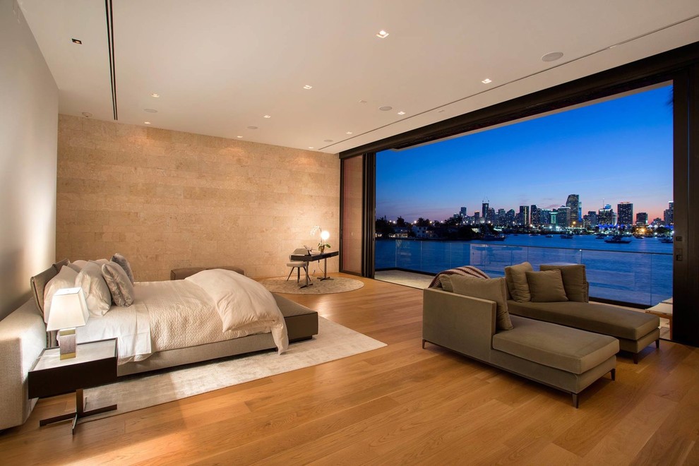 Photo of an expansive modern master bedroom.