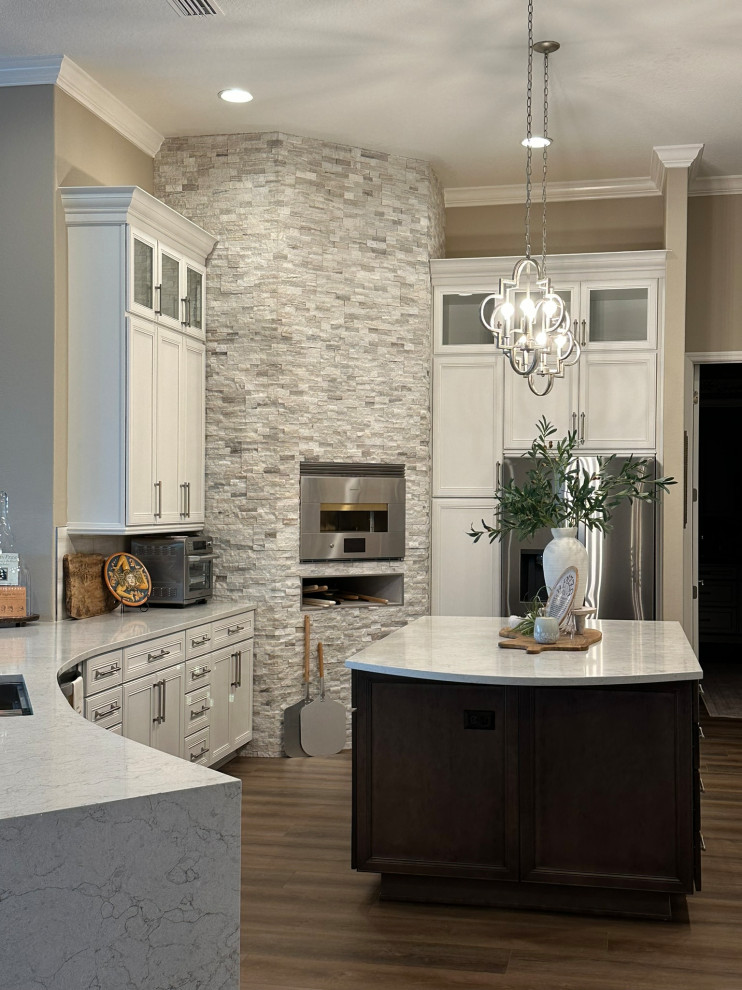 Transitional kitchen photo in Orlando with recessed-panel cabinets, white cabinets, quartz countertops and white countertops