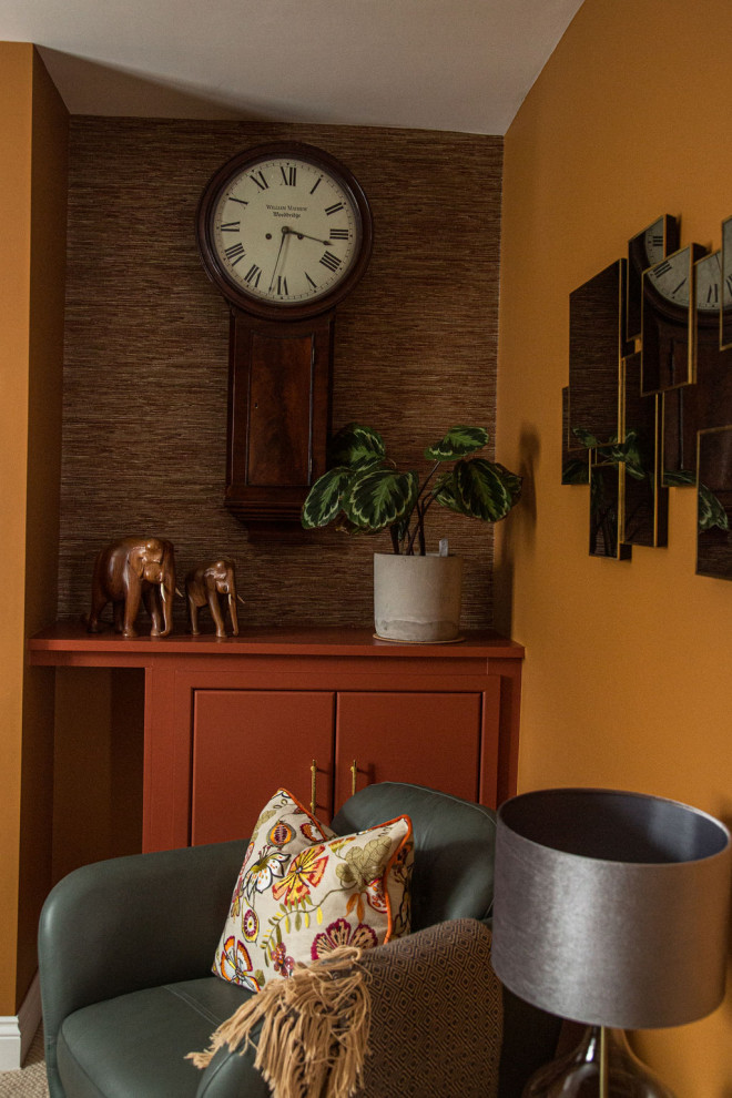 Eclectic living room curtain in Kent with orange walls, carpet, a tiled fireplace surround, white floors, wallpapered walls and curtains.