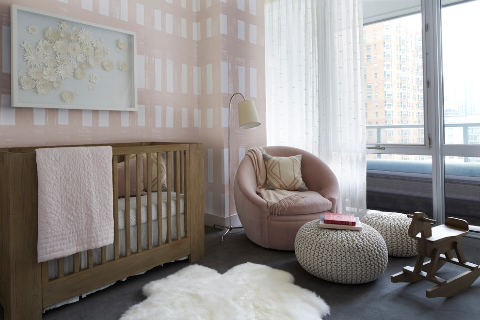 Example of a transitional girl carpeted and gray floor nursery design in Chicago with pink walls